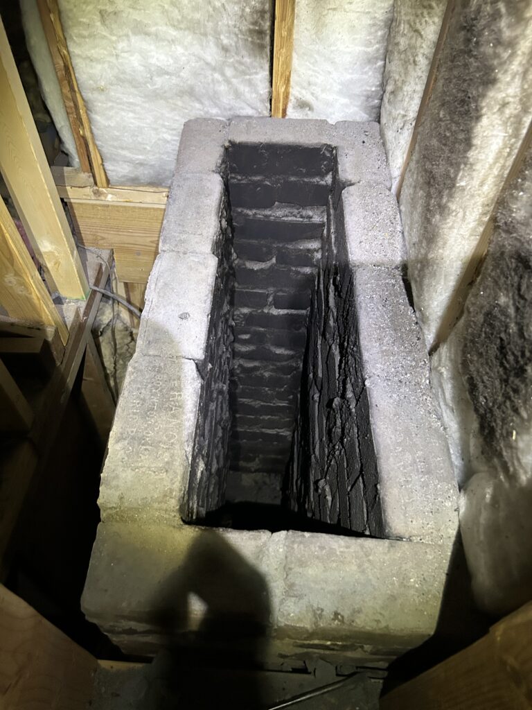 Chimney repair work by One Local Chimney technician