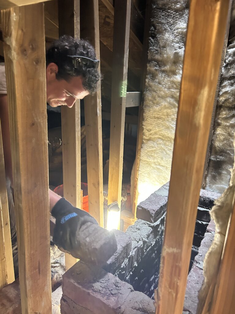 Chimney inspection on Dallas rooftop