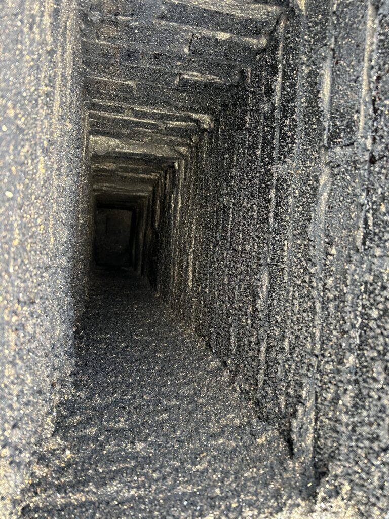 Chimney flue coated with soot and creosote before sweeping in Dallas-Fort Worth